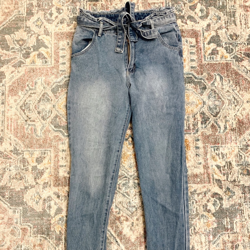 Denim jeans with denim tie belt